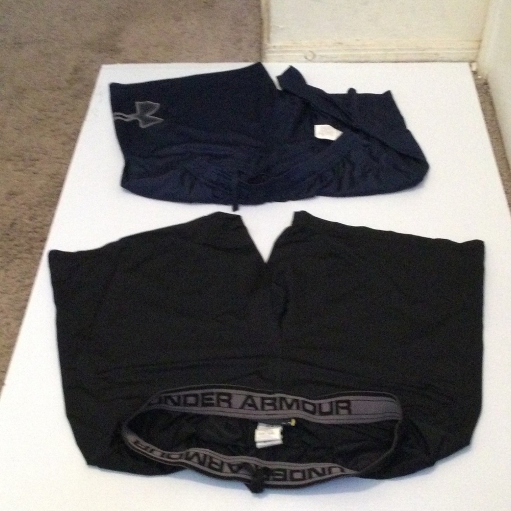 LOTS OF TWO UNDER ARMOUR LARGE SPORTS SHORTS IN GOOD SHAPE